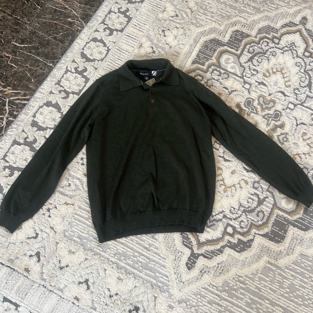 Green sweater with tags